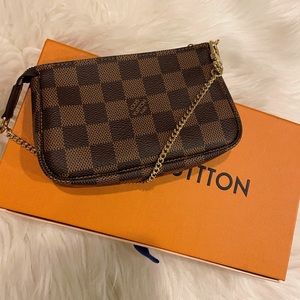 • Louis Vuitton Mini Pochette  •